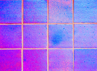 Empty backdrop element of opalescent tiles.