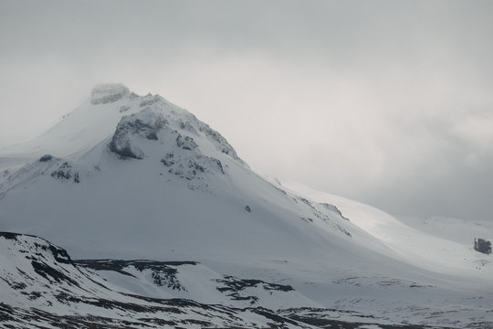 Snow Covered Mountain Peak In Iceland