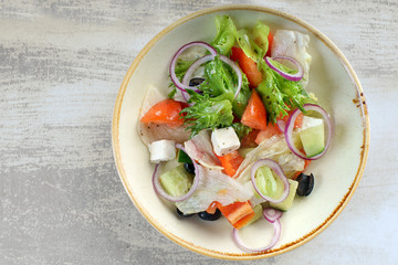 Greek salad on a light background