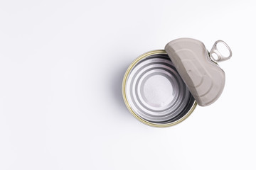 Empty open tuna tin on a white background; copy space, soft light, studio shot