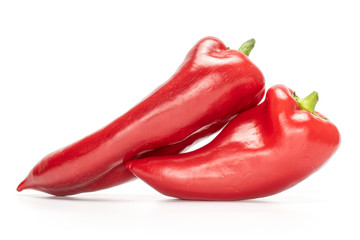 Group of two whole bright sweet red bell pepper isolated on white background