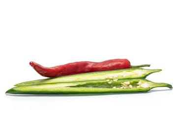 Group of one whole two halves of fresh hot pepper isolated on white background