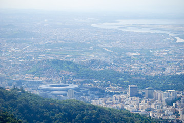 Brazil, Rio de Janeiro, view of cityscape by sea against sky