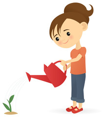 Little girl watering a plant
