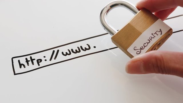 data protection online, hand placing lock with Security label on whiteboard with website url bar