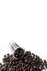 Coffee beans in cup On a white background