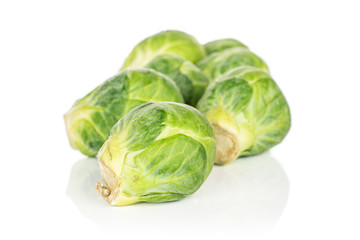 Fototapeta premium Group of seven whole fresh green brussels sprout isolated on white background