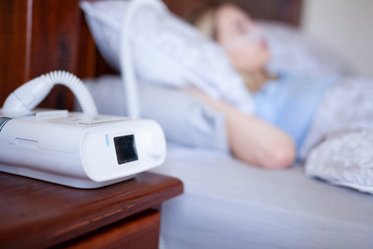 Cpap machine, Woman wearing oxygen mask with copy space