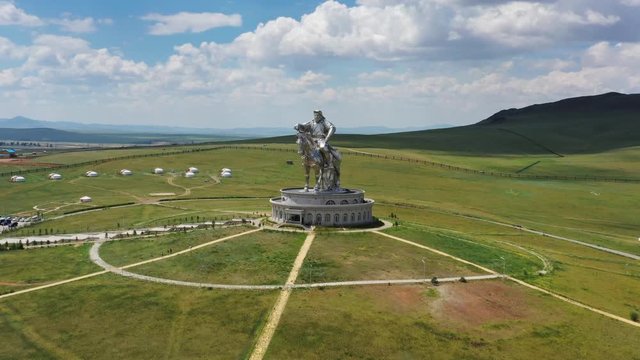 Aerial around view of huge equestrian statue of Genghis Khan in the steppe, Mongolia, Ulaanbaatar, 4k