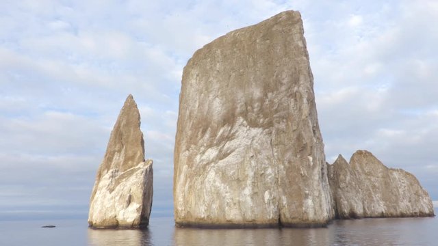 Galapagos Islands Kicker Rock nature landscape hyperlapse. Iconic landmark tourist destination for birdwatching, diving and snorkeling, San Cristobal, Galapagos Islands, Ecuador. Roca Leon Dormido