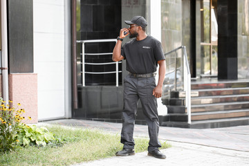 African-American security guard outdoors