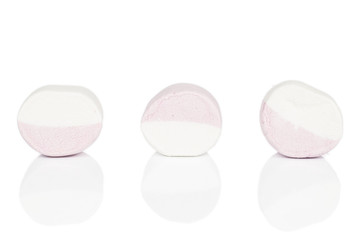 Group of three whole sweet pastel marshmallow isolated on white background