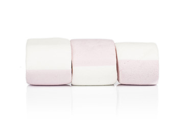 Group of three whole sweet pastel marshmallow isolated on white background