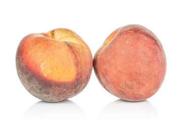 Group of two whole sweet red peach isolated on white background