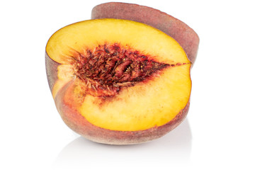Group of two halves of sweet red peach front focus isolated on white background