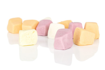 Lot of whole soft pastel candy isolated on white background
