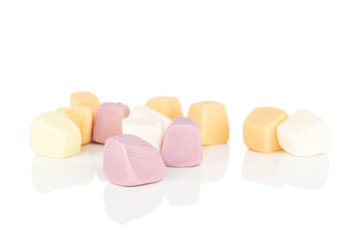 Lot of whole soft pastel candy isolated on white background