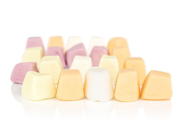 Lot of whole arranged soft pastel candy isolated on white background