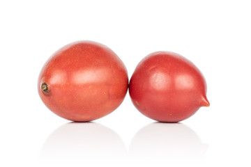 Group of two whole fresh tomato de barao isolated on white background