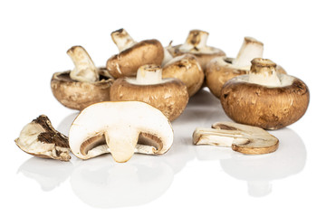 Group of seven whole one half one slice one piece of fresh brown mushroom champignon isolated on white background