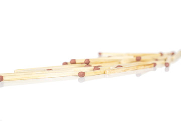 Lot of whole arranged brown safety match isolated on white background