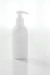 Organic natural cosmetic for baby, plastic bottle of bath cream, shampoo, lotion, shower gel, body milk on white background. Mockup