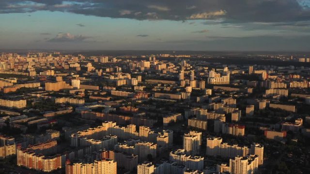 Panoramic view of sity at sunset in a warm glow.