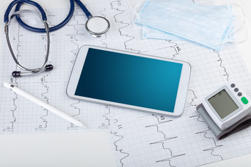 Medicine and modern technology concept with diagnostics concept with free space on tablet screen