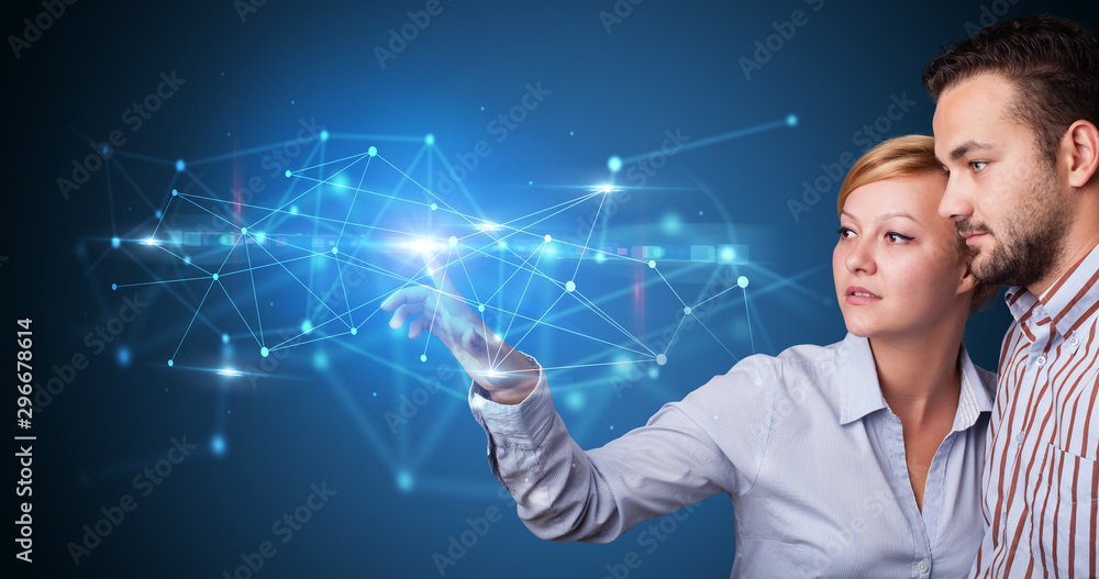 Aufkleber Man and woman touching hologram screen displaying modern web system