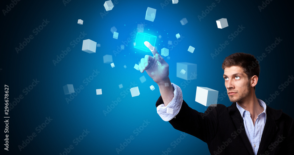 Aufkleber Man touching hologram screen displaying cube symbols