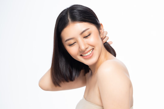 Beautiful Young Asian Woman short hair  with Clean Fresh Skin. Face care, Facial treatment, Cosmetology, beauty and healthy skin and cosmetic ideas concept.