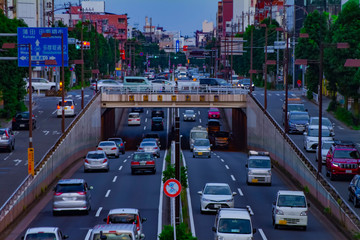 A downtown street at Kanpachi avenue in Tokyo daytime long shot