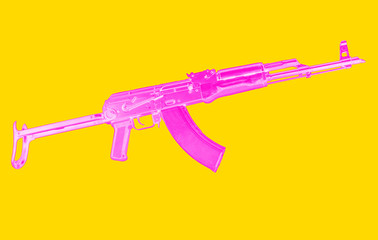 Russian assault rifle AK-47 on a pink background