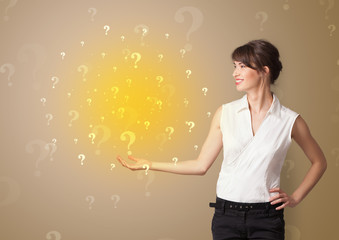 Young person presenting something with question sign concept