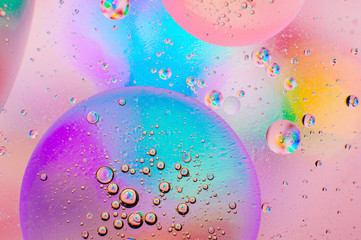 Macro background of oil drops on water surface