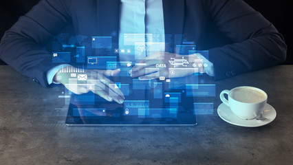 Business woman working on tablet with global database concept and dark background