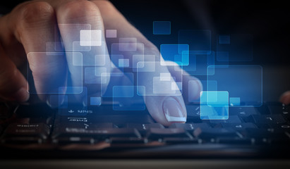Business woman typing on keyboard with colorful concept