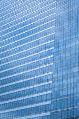 Blue glass windows of modern office building