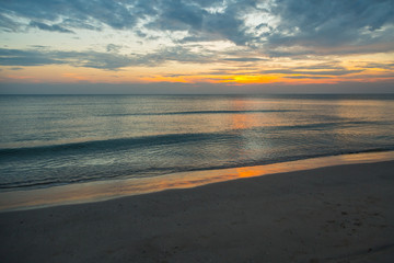 Siluette sunset at the beach background