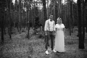 Beautiful wedding couple in a forest