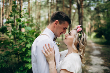 Beautiful wedding couple in a forest