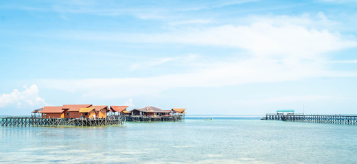 Fototapeta na wymiar beautiful and colorful cottages at Derawan Island Resort, Borneo Indonesia