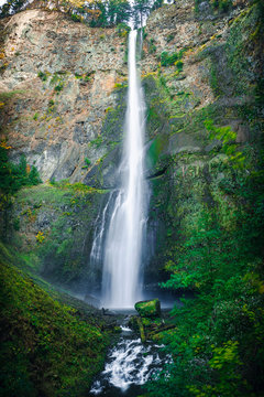 Upper Waterfall of Multnomah Falls Flowing Over Rock Cliff in Oregon