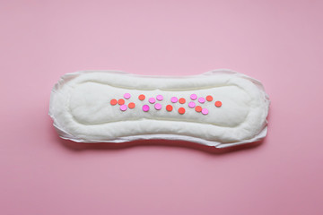 Menstrual pad with pink glitter confetti, women's health, lifestyle