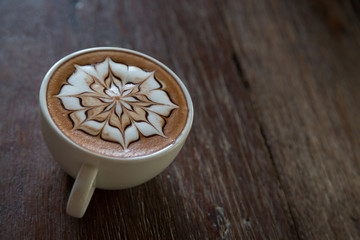 Cup of coffee with  latte art on top