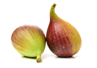 Ripe figs on a white background