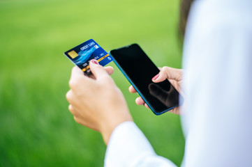 Payment for goods by credit card via smartphone.