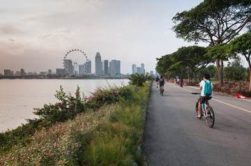 People riding a bicycle in the park singapore