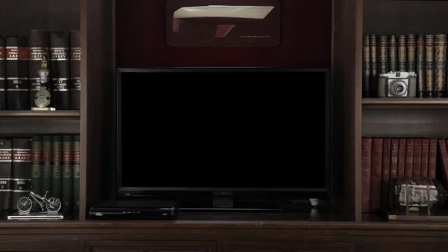 tv in book shelf with transparent screen / alpha channel