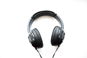 Fototapeta na wymiar Black headphone with wire on white background, isolated, listen to audio